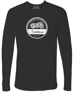 The SchitStorm Moto Long Sleeve Tee in black, the ultimate statement piece for all those that rule the road on two wheels.
